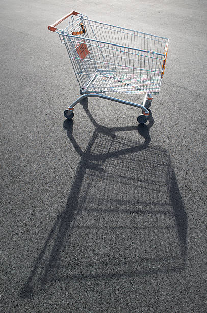 istock Empty Shopping Cart with Shadow in Parking Lot 173838613