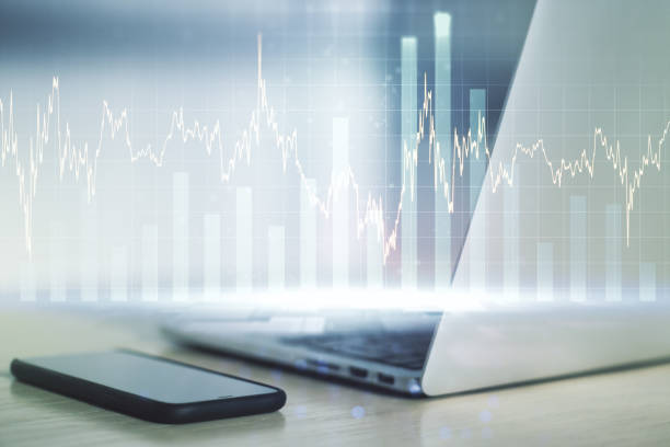 istock Abstract creative financial graph on modern laptop background, financial and trading concept. Multiexposure 1738393877