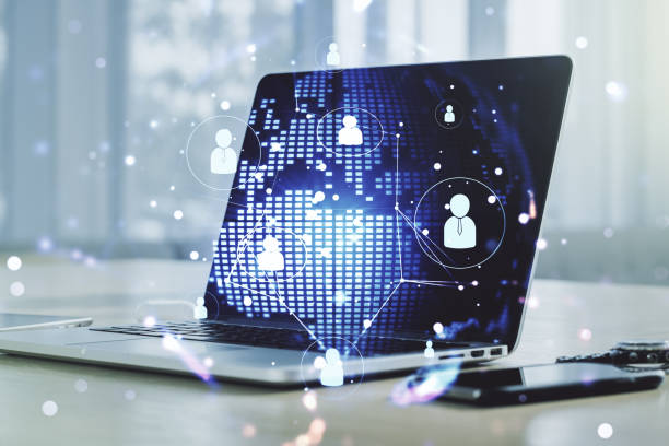 istock Social network concept with world map and modern laptop on background. Multiexposure 1738394189