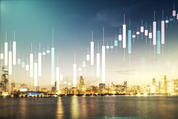 Double exposure of abstract creative financial chart hologram on Chicago skyscrapers background, research and strategy concept stock photo
