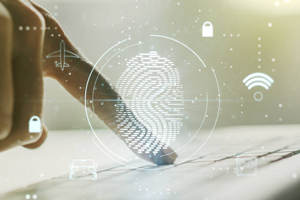 istock Multi exposure of abstract fingerprint scan interface with hands typing on computer keyboard on background, digital access concept 1738394915