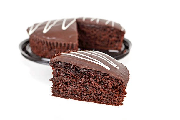 Slice of rich chocolate mud cake stock photo