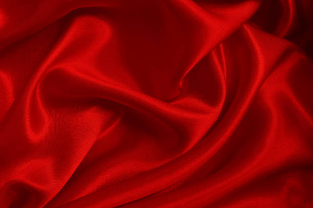 istock Dark red fabric texture background, detail of silk or linen pattern. 1738396936