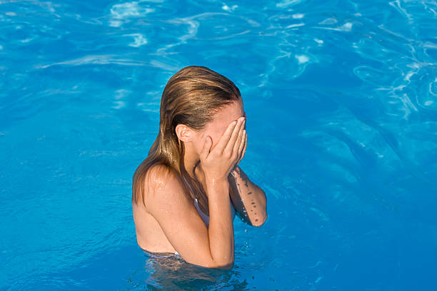 istock slim woman in a swimmingpool 173839809