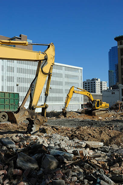 istock Urban Renewal - Backhoes at Work 173839905