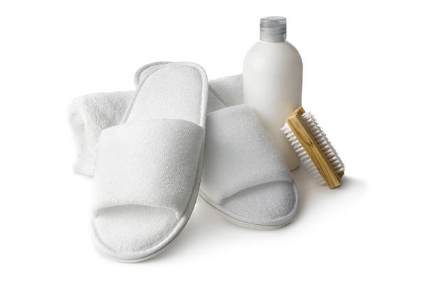 istock Bath: Slippers, Nailbrush and Lotion Isolated on White Background 173840142