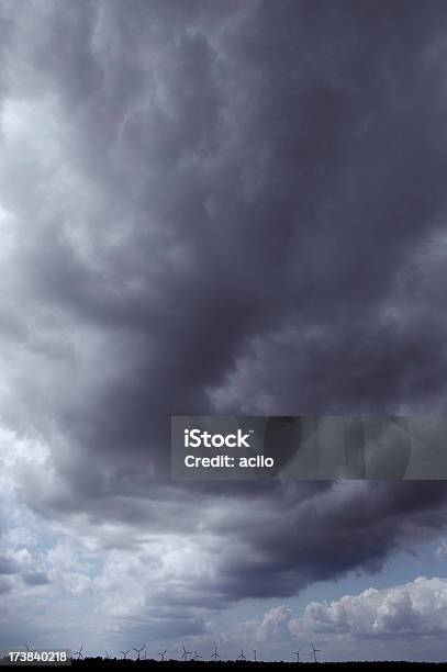 Storm Clouds And Wind Energy Stock Photo - Download Image Now - Backgrounds, Black Color, Blue