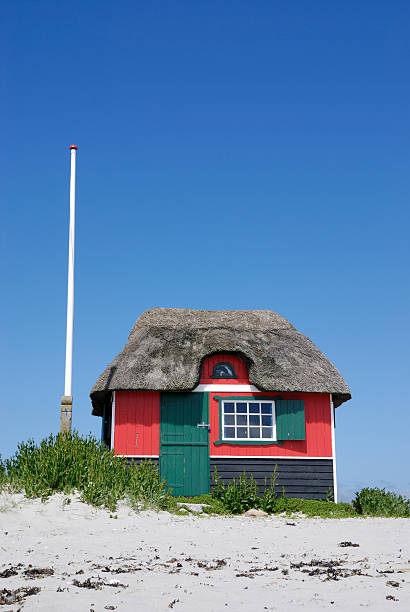 istock Beach hut with thatched roof, bathing box 173840550