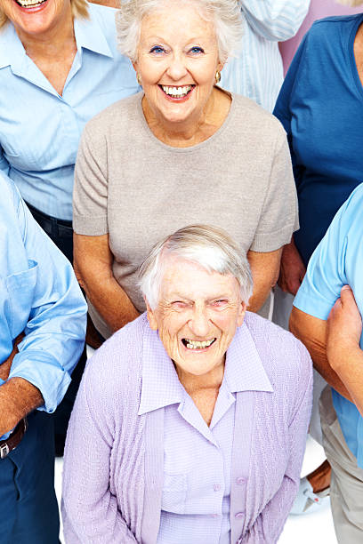 istock Cheerful senior women standing together 173840827