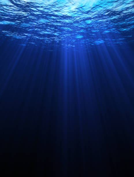 mar azul profundo - sunbeam underwater blue light fotografías e imágenes de stock