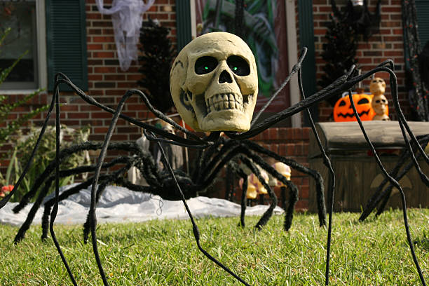istock Creepy spider with human skull for a head 173840875