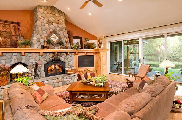 istock River rock fireplace in living room 173841138