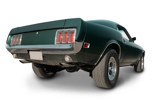 Late 1960's Mustang Muscle Car Low rear view of an Mustang muscle car.  Clipping path on vehicle.  All logos removed. 1968 stock pictures, royalty-free photos & images