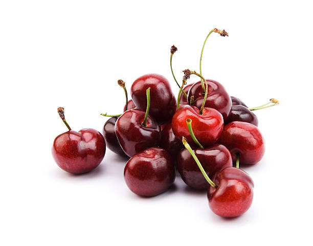 A bunch of fresh cherries isolated on a white background stock photo