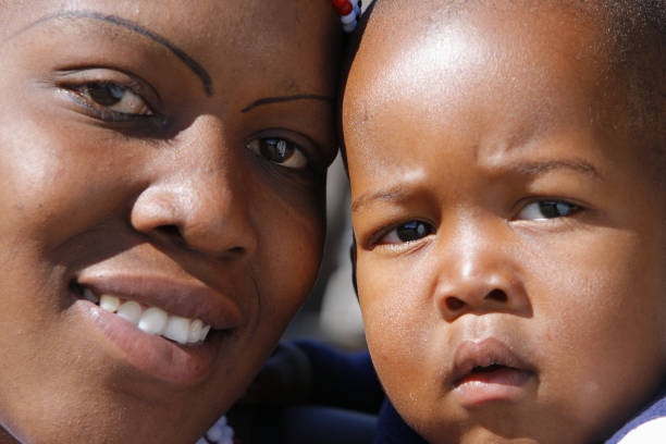 istock Zulu woman and child 173842015