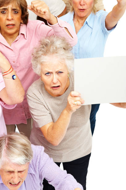 istock Angry group of old women with sign boards 173842071
