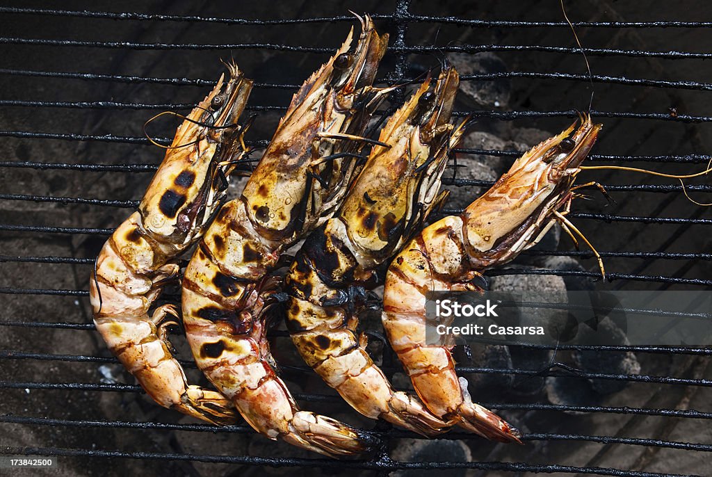 Tiger prawns Big tiger prawns on gril. Barbecue - Meal Stock Photo