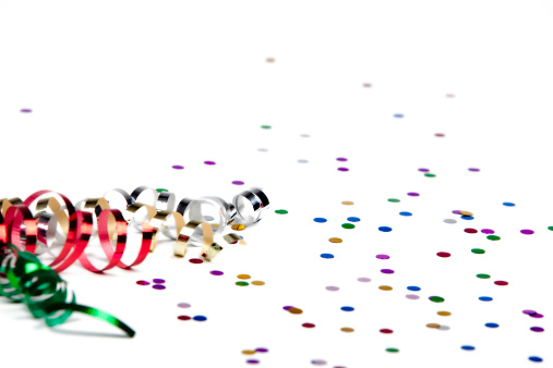 Ribbon and confetti isolated on white.  Party time!