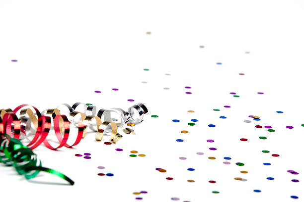 Ribbon and confetti isolated on white Ribbon and confetti isolated on white.  Party time! streamers and confetti stock pictures, royalty-free photos & images
