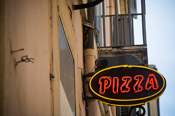 istock Illuminated Pizza Sign in Rome 173845023