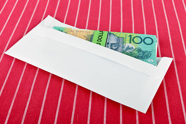 Money in a plain envelope stock photo