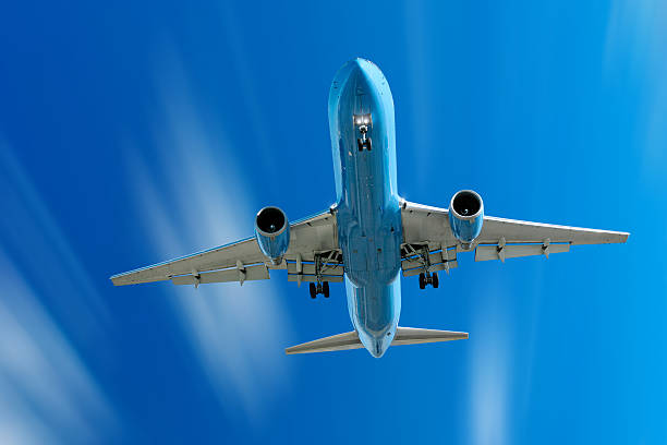 istock XL jet airplane landing in motion blur sky 173847187