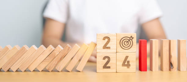 istock 2024 year with falling blocks on table, Risk Management, recession, business financial, Resolution, strategy, goal, New Year planning and inflation economy concepts 1738474286