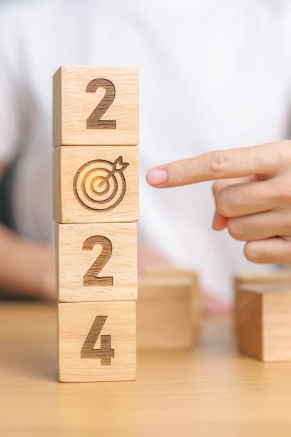 istock 2024 block with dartboard sign. Business Goal, Target, Resolution, strategy, plan, Action motivation, mission, thinking, and New Year start concepts 1738474305