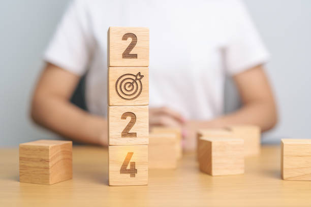 istock 2024 block with dartboard sign. Business Goal, Target, Resolution, strategy, plan, Action motivation, mission, thinking, and New Year start concepts 1738474307