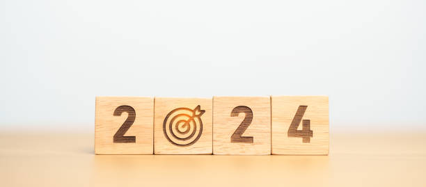 2024 year block with dartboard icon. Goal, Target, Resolution, strategy, plan, Action, mission, motivation, and New Year start concepts