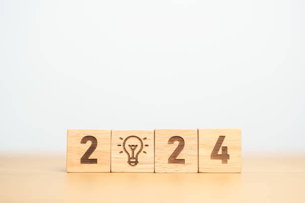 istock 2024 block with lightbulb. Business Idea, Creative, Thinking, brainstorm, Goal, Resolution, strategy, plan, Action, change and New Year start concepts 1738475912