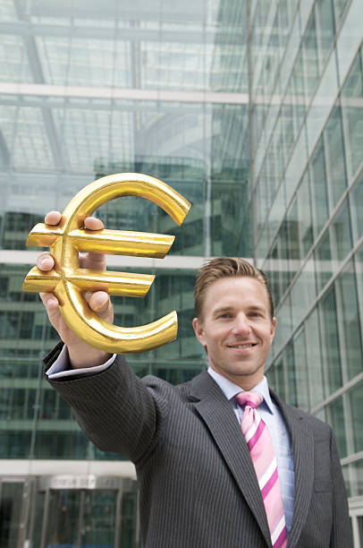 istock Cheerful Businessman Holds Euro 173848615