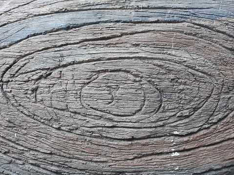 Rough wooden surface texture with round oval circle pattern motif for template background or rendering