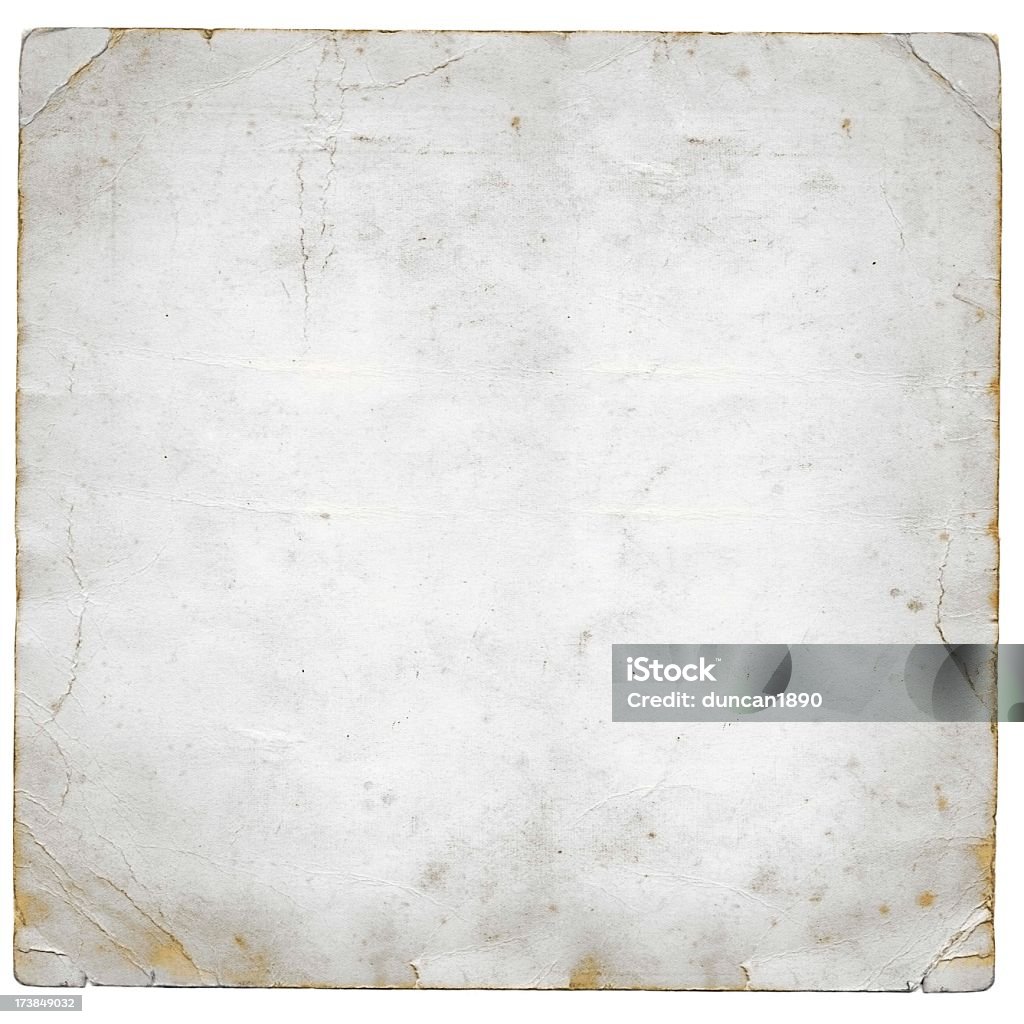 Grunge white paper An old peice of square white paper with frayed corners Textured Stock Photo
