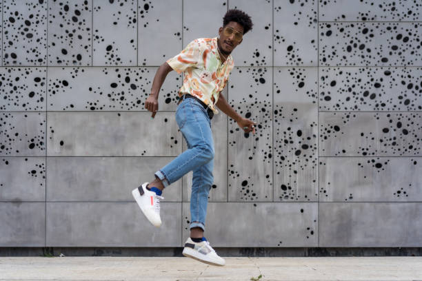 istock Fun man jumping on an urban street 1738494063