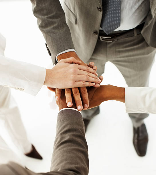 istock Group of business people stacking their hands together 173849407