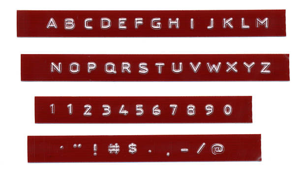 istock Embossed alphabet letters red plastic dymo tape 173849891