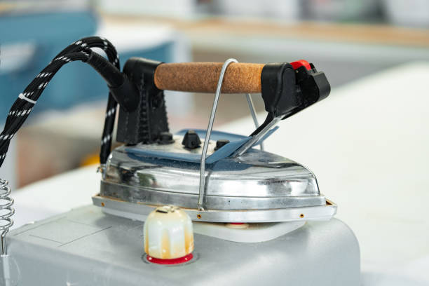 Close up photo of professional iron in a tailor's workshop