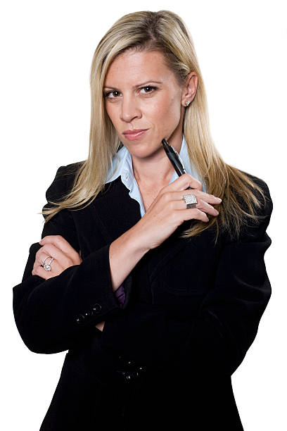 Portrait of attractive businesswomen holding pen stock photo