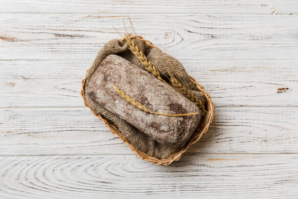 istock Freshly baked bread on basket against natural background. top view bread copy space 1738513759
