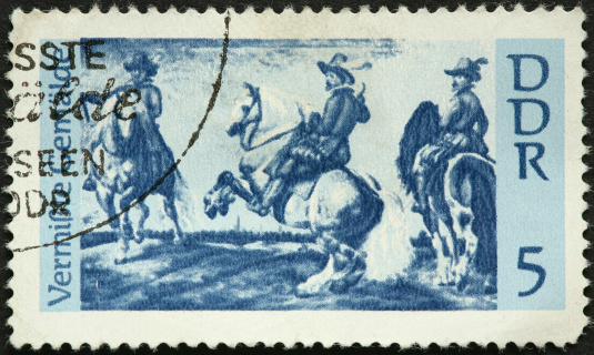 three musketeers on horseback