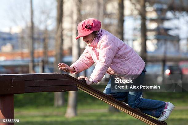 Girl Climbing On The Play Park Stock Photo - Download Image Now - Activity, Beauty, Child