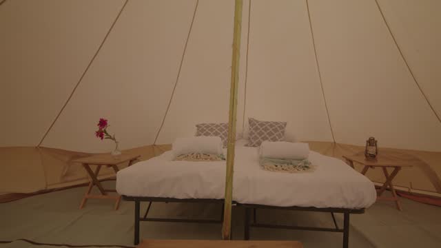 Wide shot of bell tent entrance
