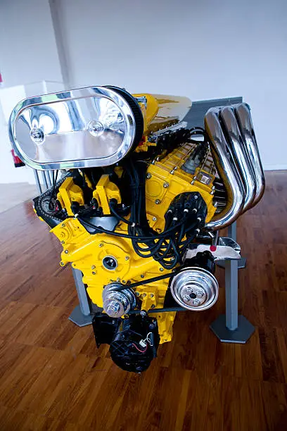 A powerful V12 engine in bright yellow