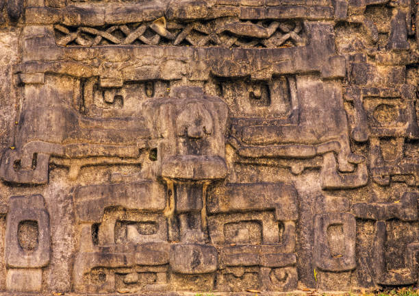 istock Belize: Mayan Ruins at Caracol, stone jaguar head 173852764
