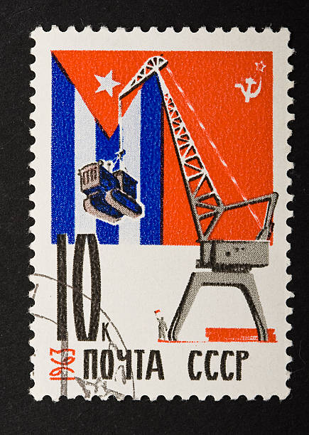 Soviet stamp about Cuba and CCCP cooperation Soviet stamp about Cuba and CCCP cooperation with clipping path. You can clip it and paste it in your own revolutionary postal compositions! level luffing crane stock pictures, royalty-free photos & images