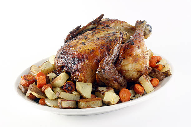 istock Delicious roasted chicken dinner with vegetables. 173853287