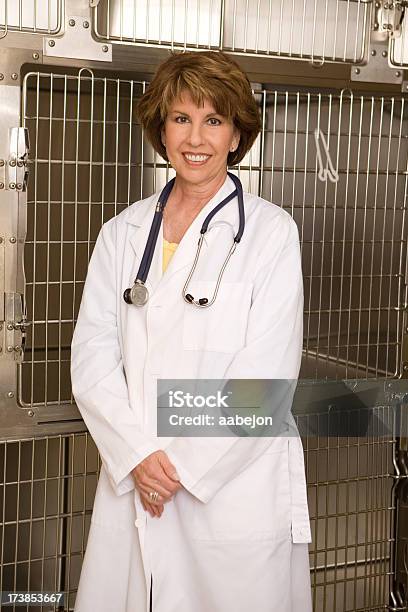Veterinarian Stock Photo - Download Image Now - 40-49 Years, Adult, Adults Only