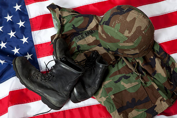 istock Army boots and uniform on USA flag 173854173