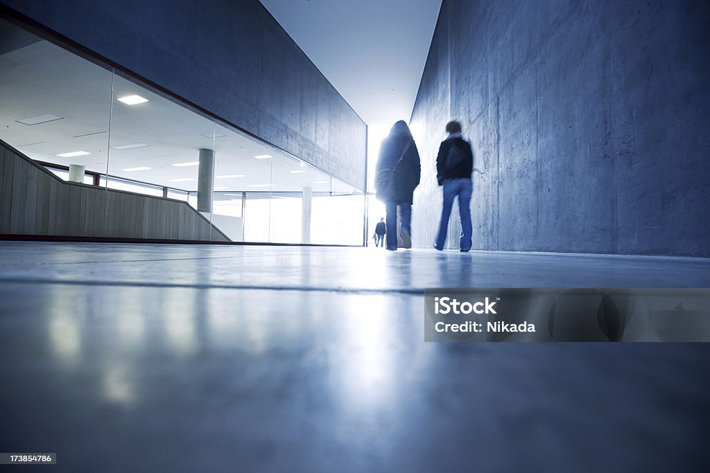 walking people people walking in contemporary architecture Blurred Motion Stock Photo